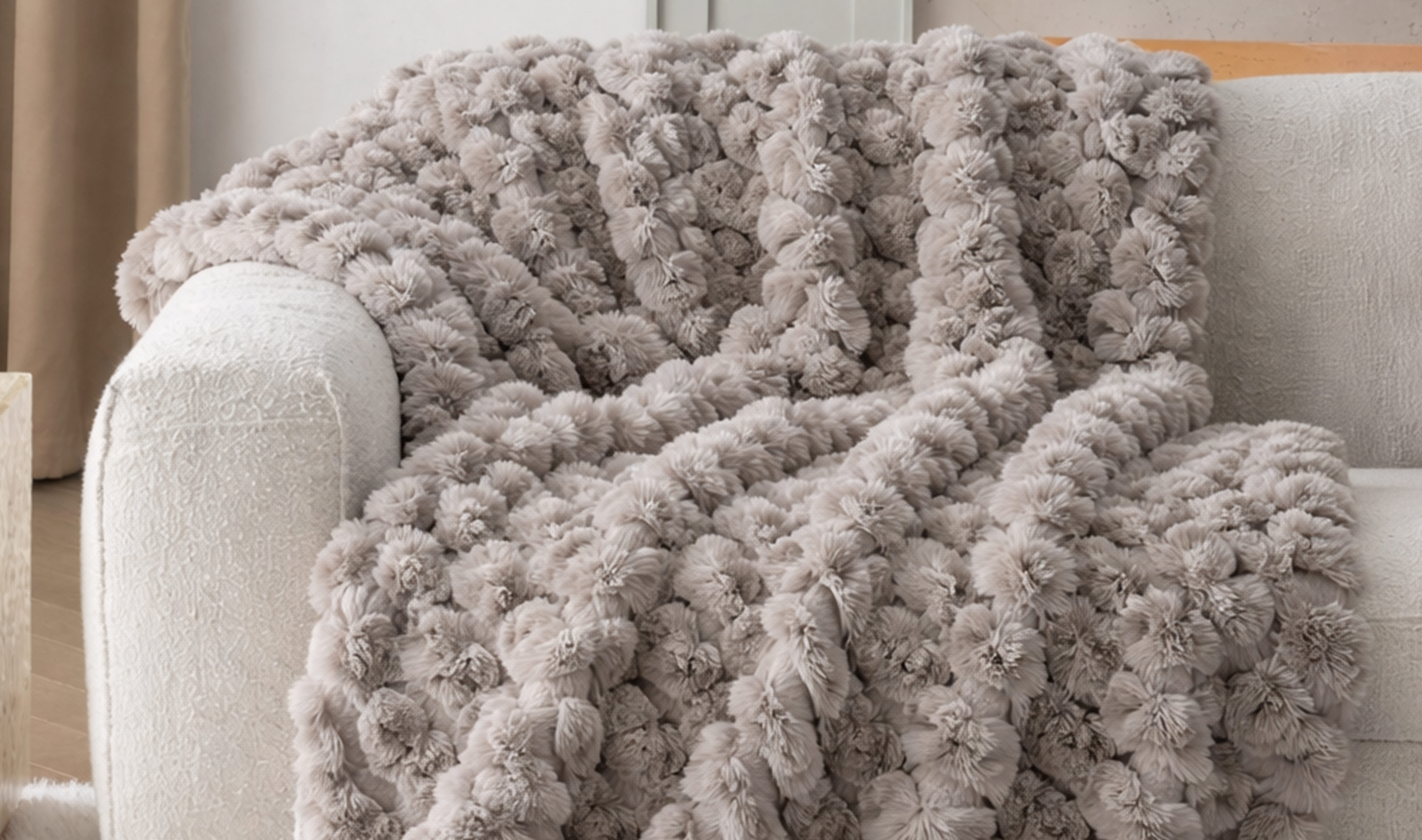 Statement throw draped on armchair